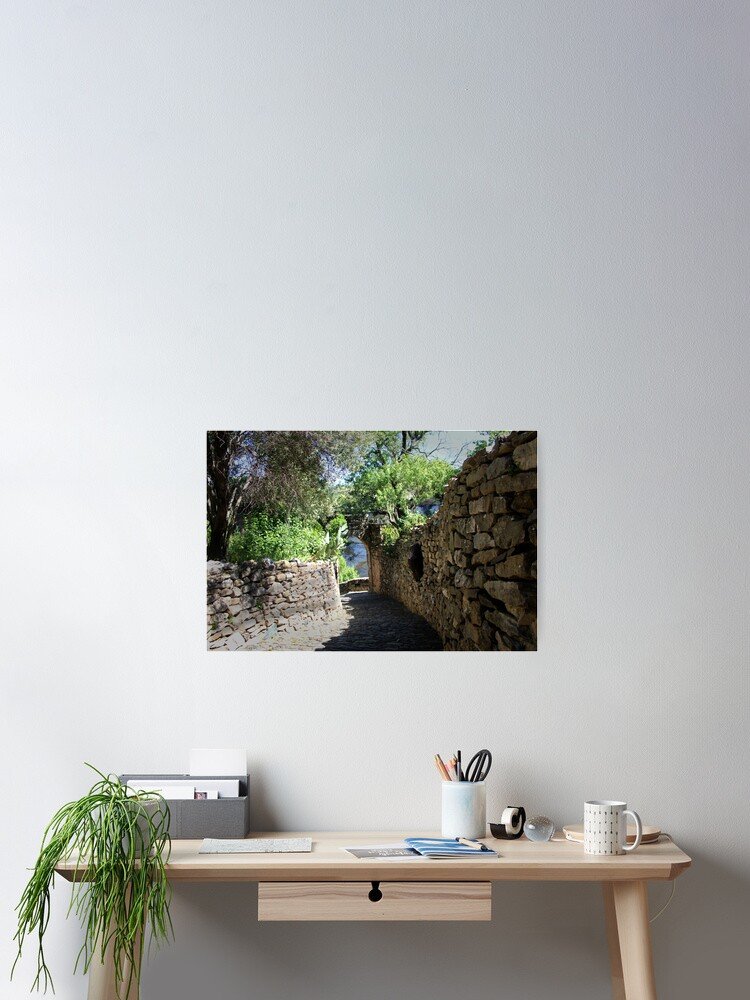 Stone alley in Minerve, Southern France medieval village with historic stone houses
